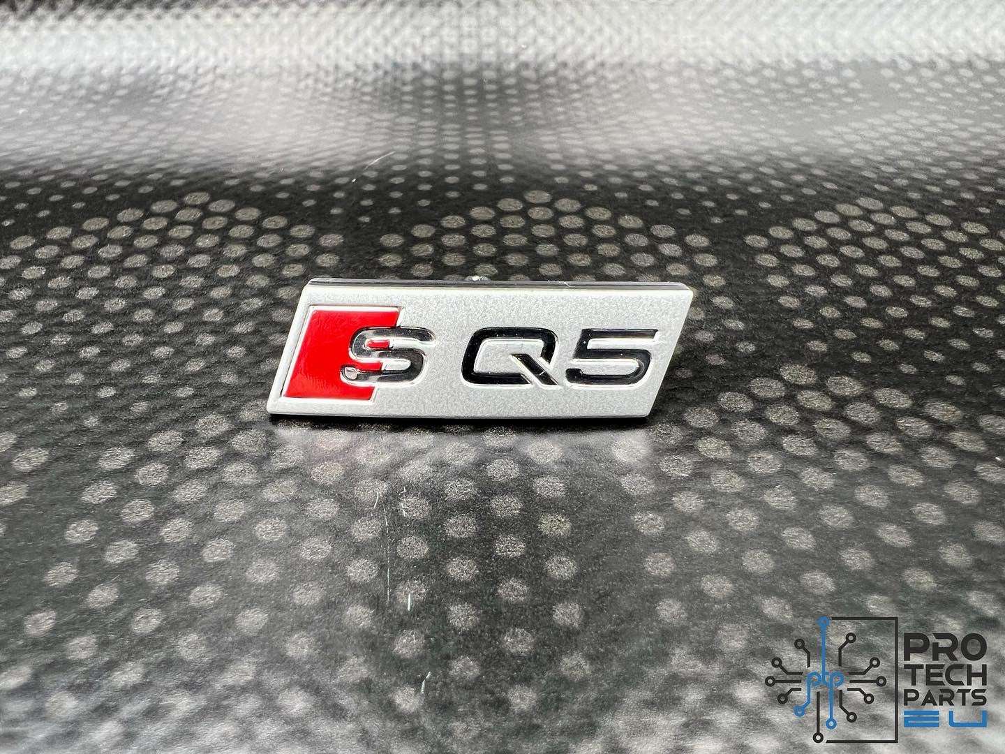
                  
                    Audi Sline sq5 steering wheel cover badge/logo oe new
                  
                