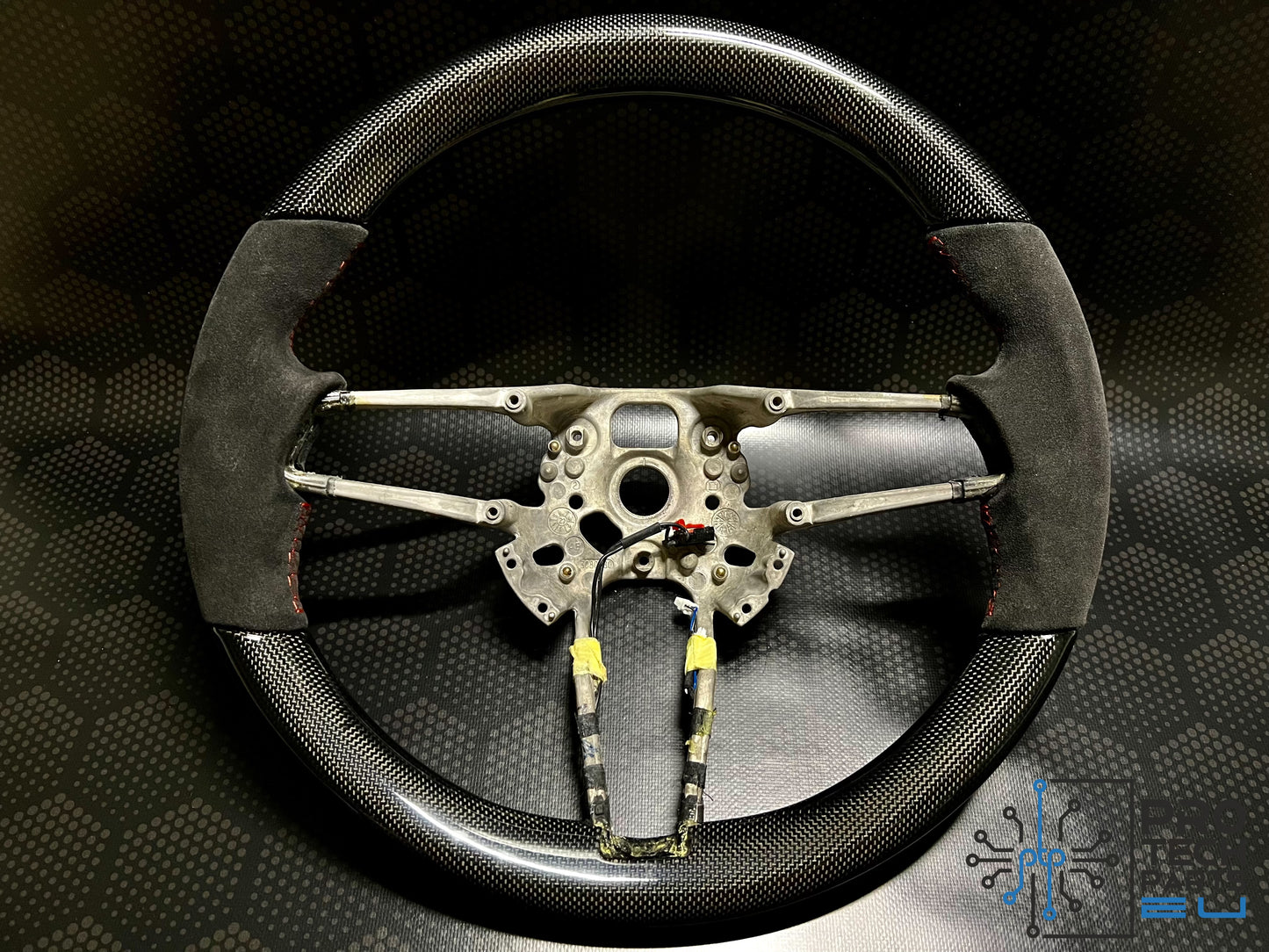 
                  
                    Porsche Carbon fiber steering wheel race-tex rrace yellow stitches 991 911/Cayenne/Cayman/Macan
                  
                