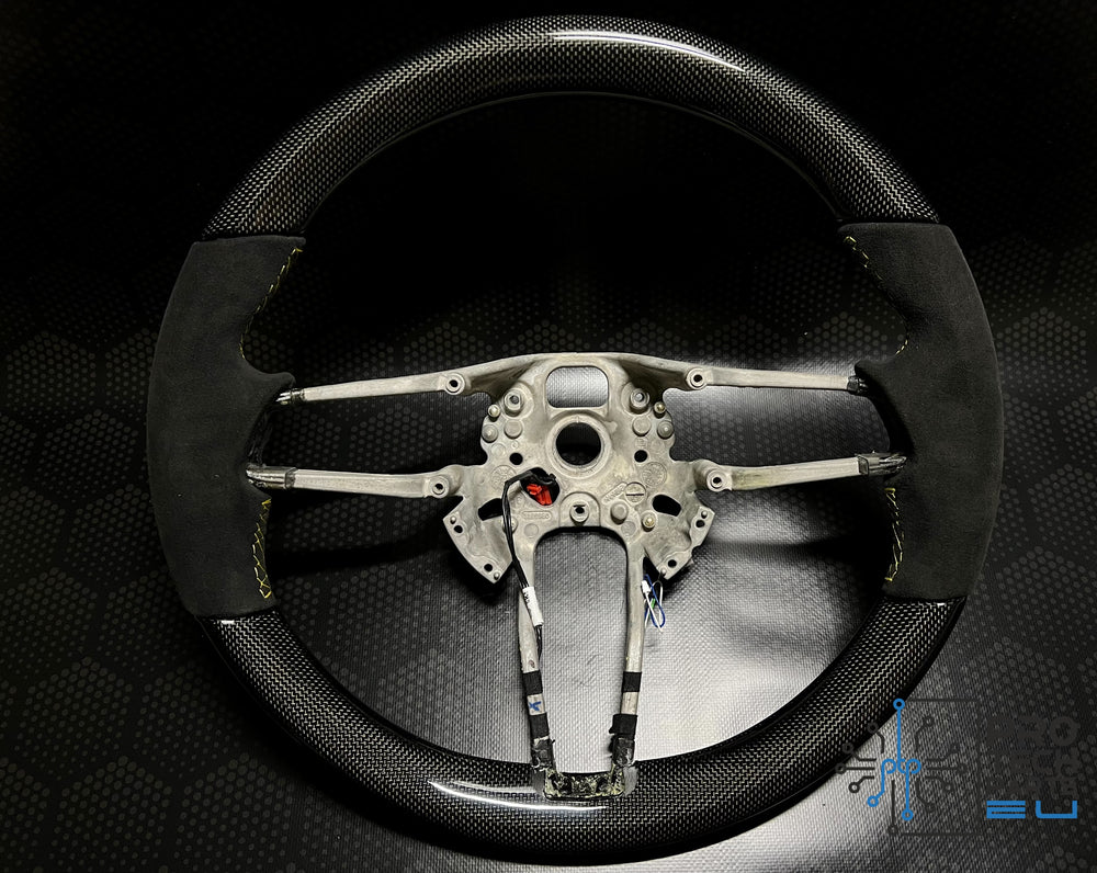 
                  
                    Porsche Carbon fiber steering wheel race-tex rrace yellow stitches 991 911/Cayenne/Cayman/Macan
                  
                