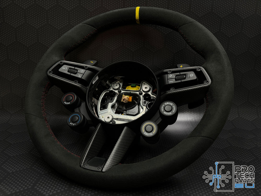 
                  
                    Volan Porsche race-tex GT3RS 992 911 fibra de carbon PACHET WEISSACH 
                  
                